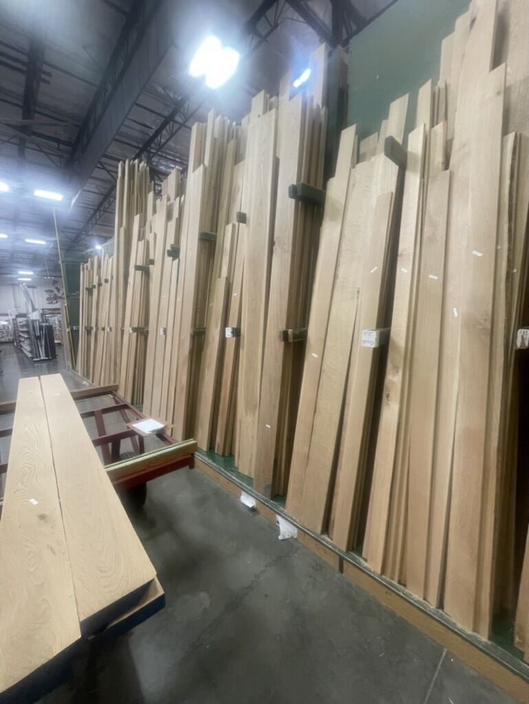 Racks of hardwood lumber at the supplier