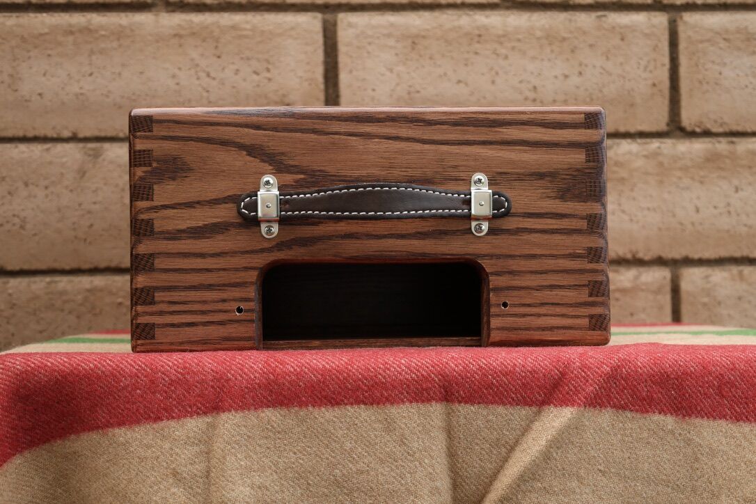 Oak head cabinet with a leather handle