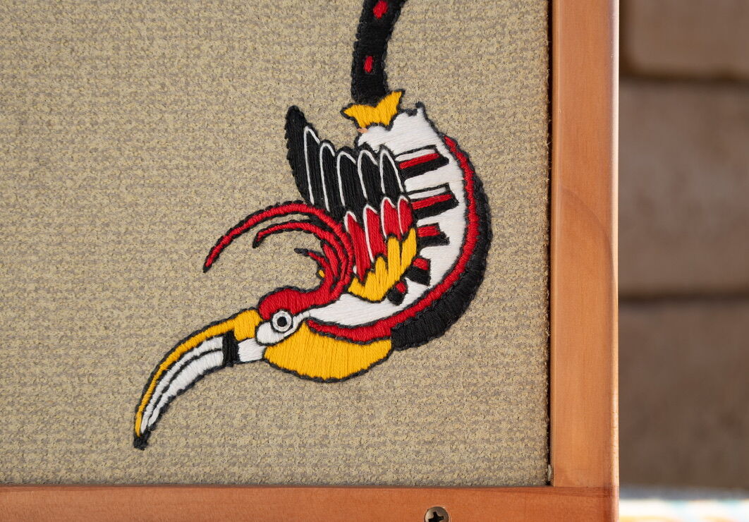 Close-up of the embroidered toucan