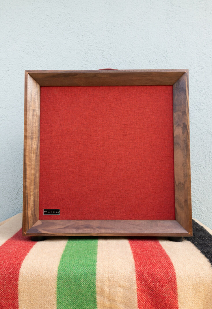 Walnut extension cabinet with red grill cloth